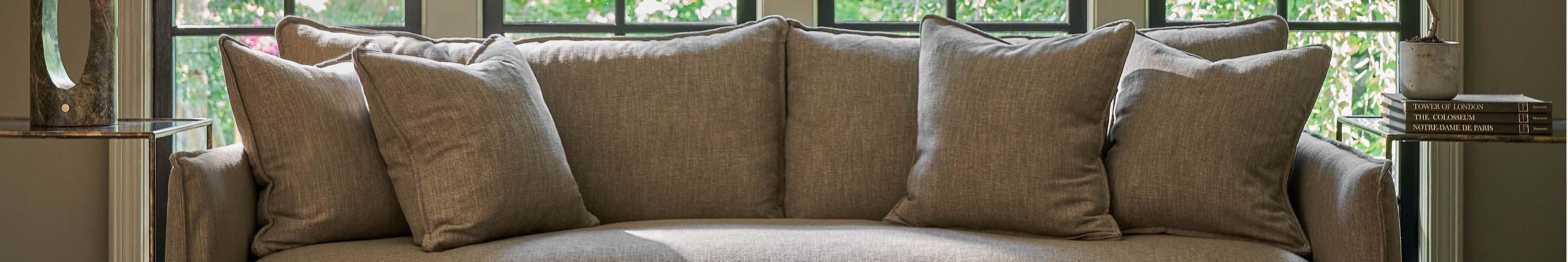 Green sofa with green cushions
