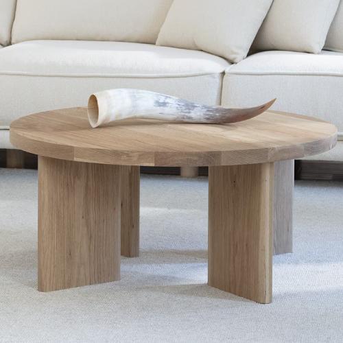 Wood coffee table holding horn