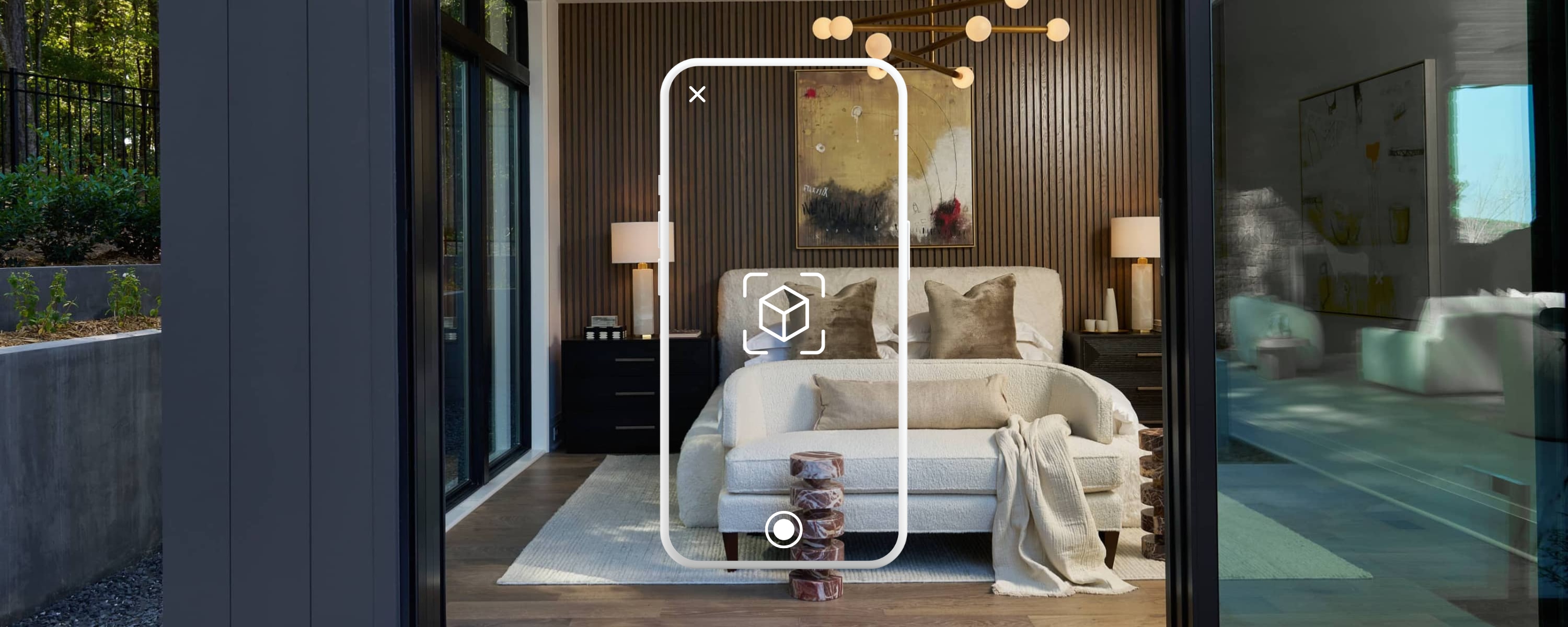 outline of an iphone using augmented reality on a modern bedroom