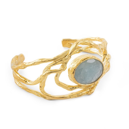 Gold natural formed ring with a blue stone