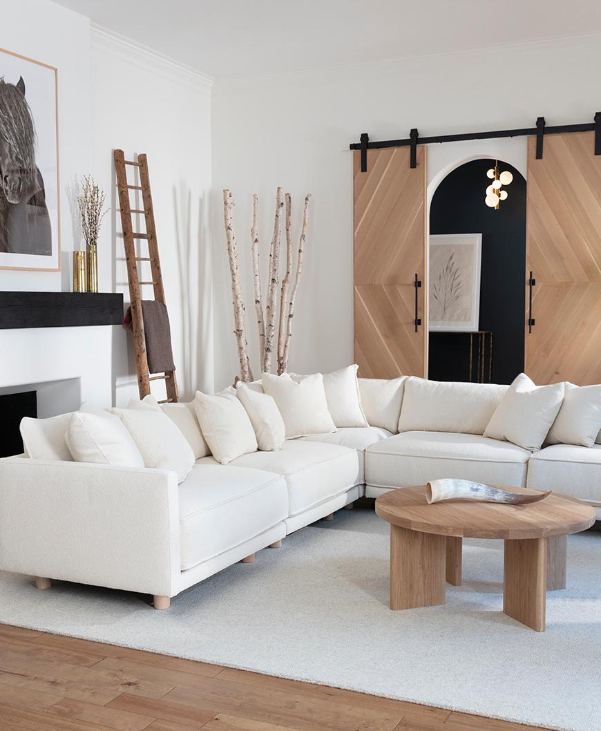 stain resistant white sofa next to oak coffee table