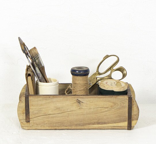 Brick mold with sewing supplies in it