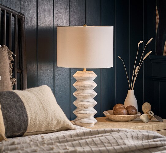 Zig-Zag wood and white table lamp on a bedside table