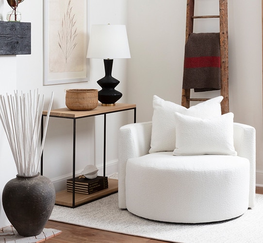 Textured black table lamp on a small console table