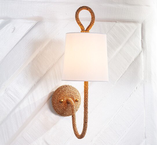 Rope wall sconce on a white wall