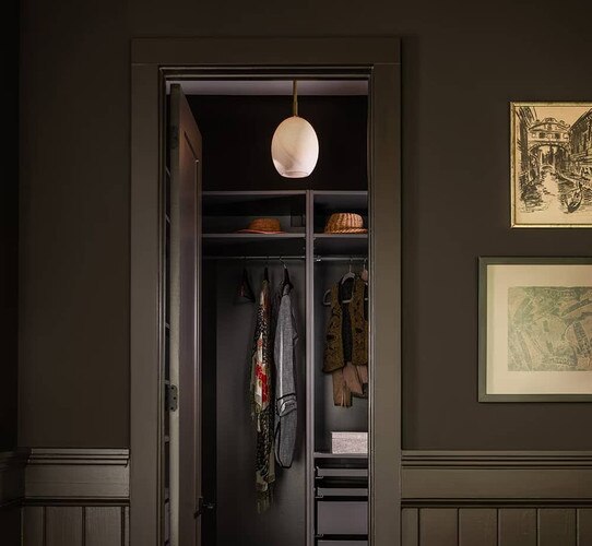 Alabaster pendant in clothes closet