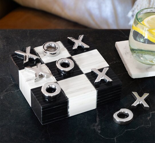 White and black bone tic-tac-toe board with polished nickel pieces