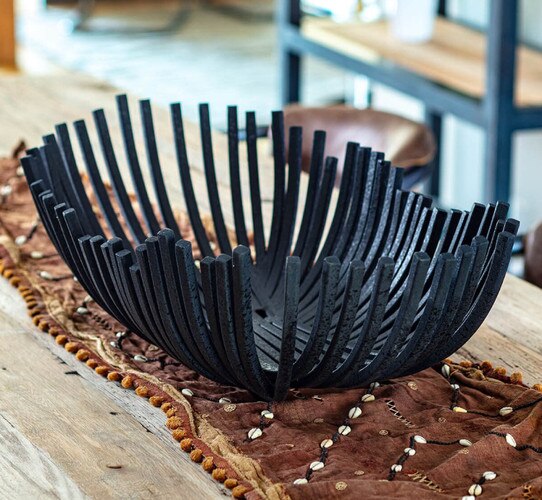 Metal oblong bowl on a dining room table