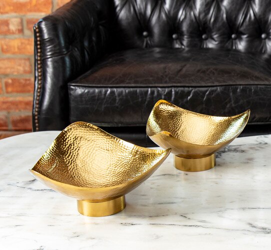 Brass bowls on a marble coffee table