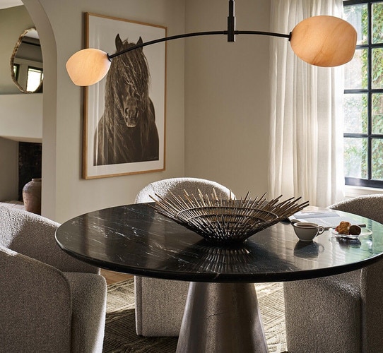 Dining room table with a metal bowl in the center