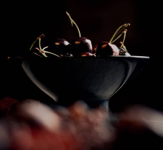 Marble martini bowl holding cherries