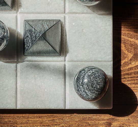 Marble tic tac toe board with black pieces