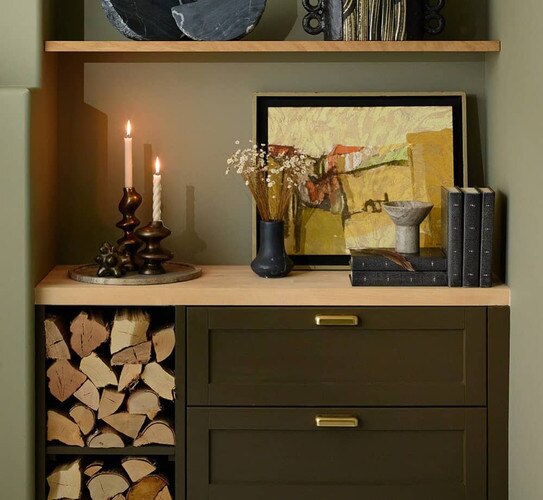 Black marble vase on a built in shelf