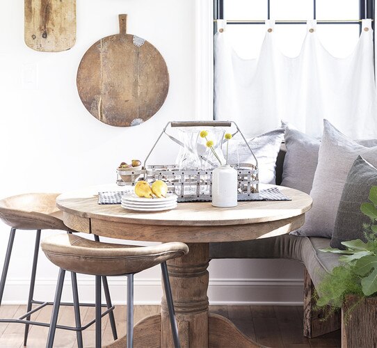 Wood breakfast nook table with leather counter stools