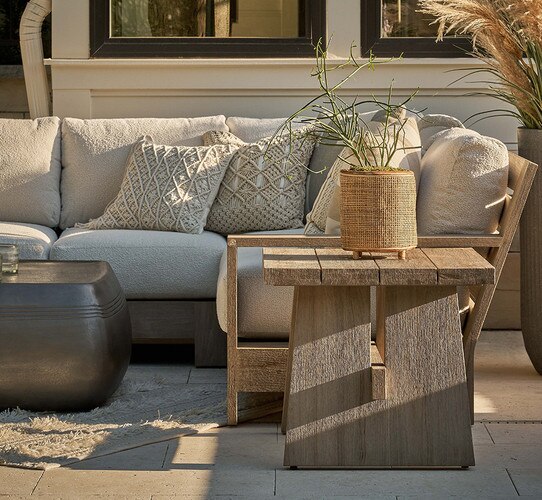 Wood rectangle end table in an outdoor patio setting