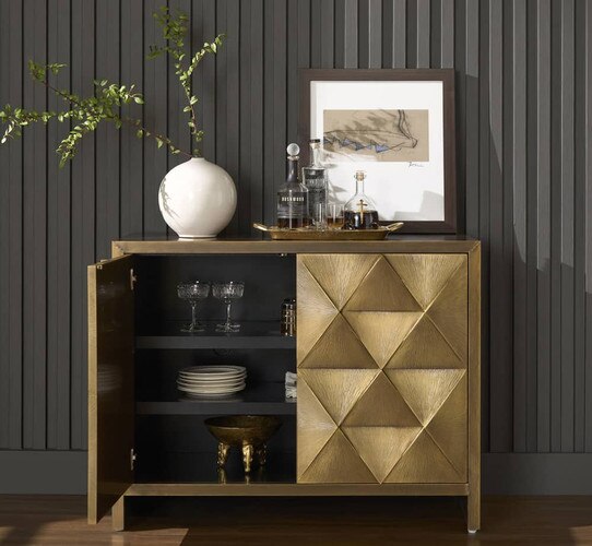 Bar cabinet with one open door showing glasses and plates