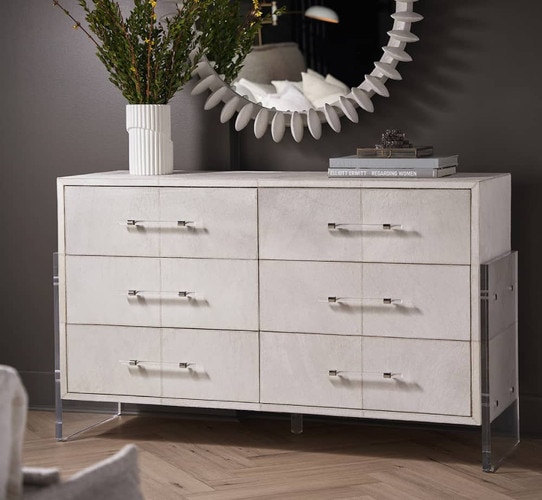 White cabinet with six dressers and nickel pulls
