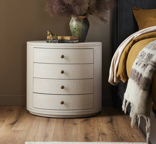 Circular white nighstand with four drawers