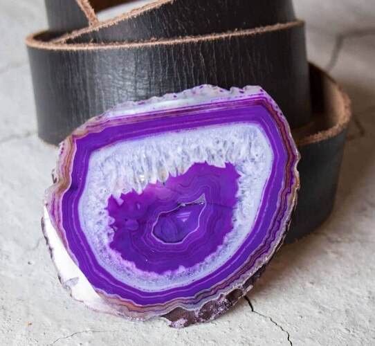 Purple agate on a large black belt