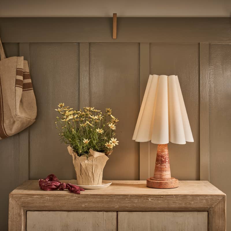 console table with two wood buffet lamps on each end