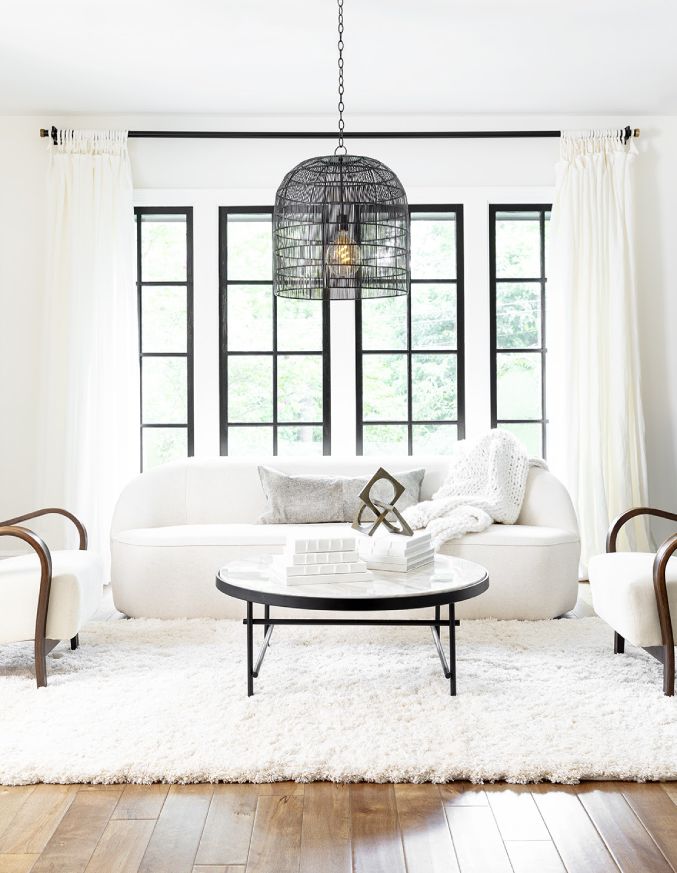 A Shabby chic living room with white wool furniture