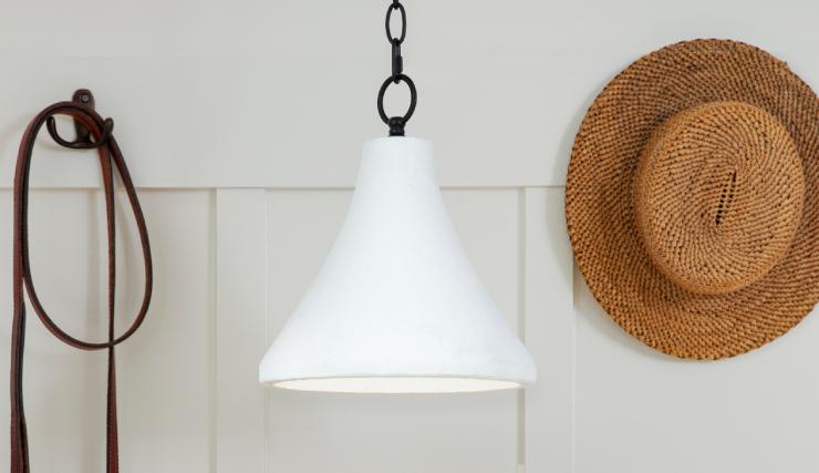 A well lit contemporary breakfast nook styled with a Concrete Pendant