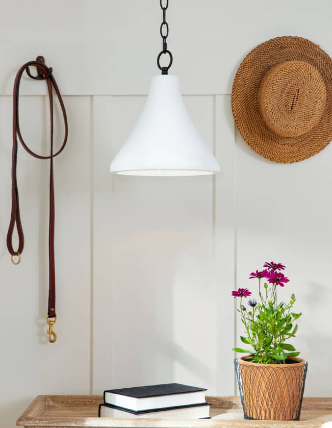 A well lit contemporary breakfast nook styled with a Concrete Pendant