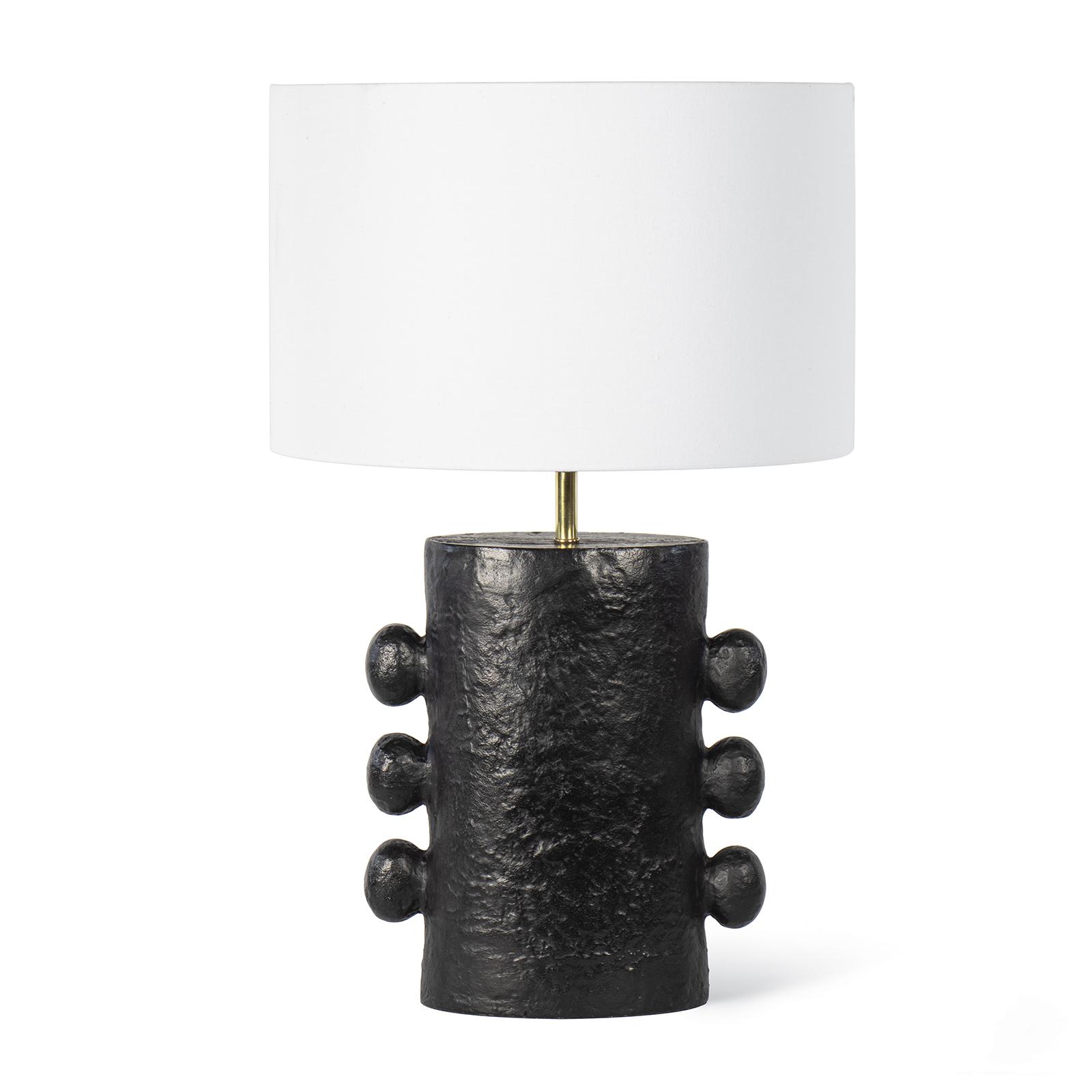 Modern black metal table lamp with a white shade