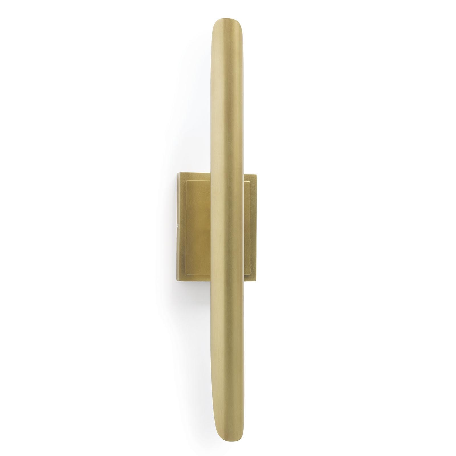 Modernism inspired natural brass sconce with a sleek finish