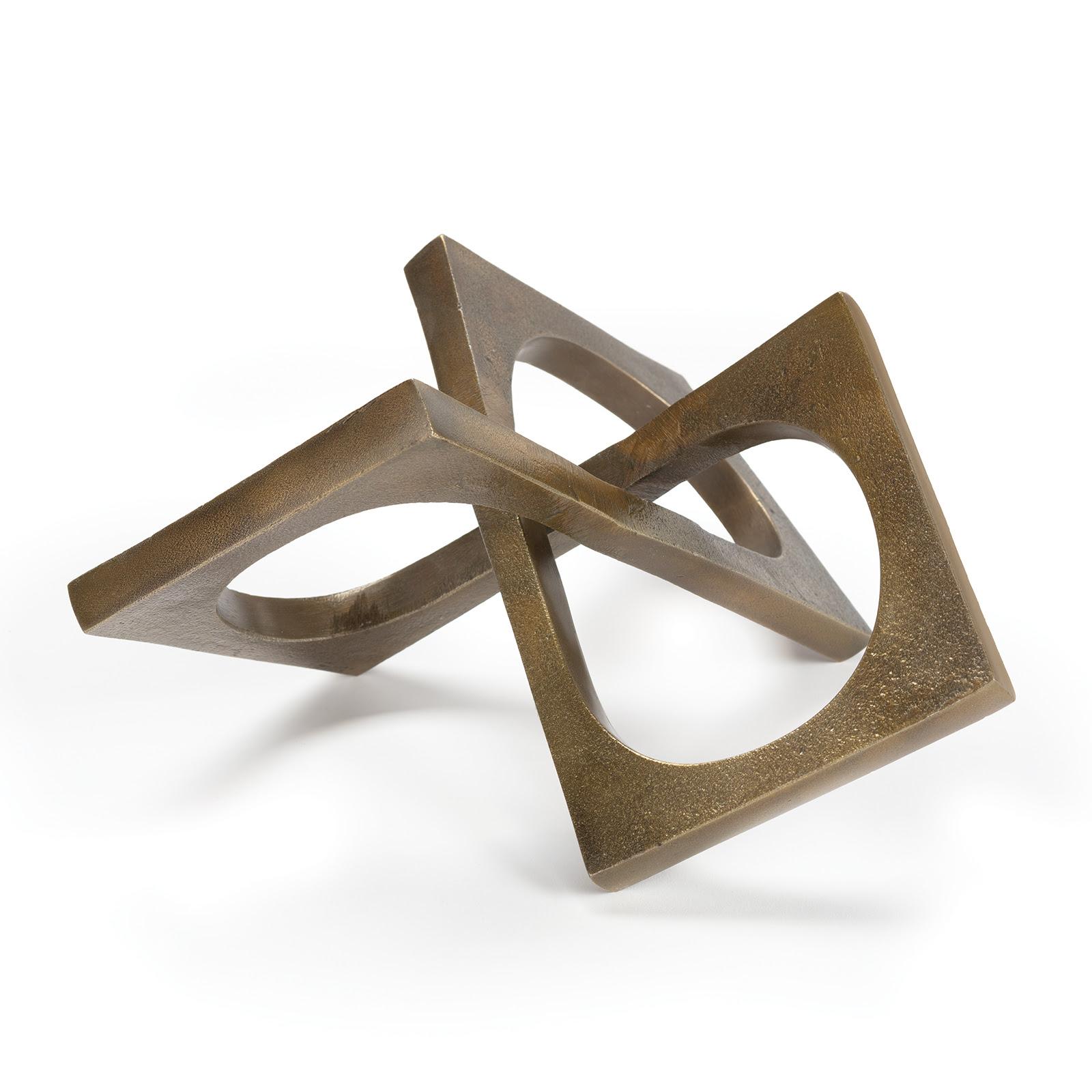 Modern natural brass sculpture with angular and curved edges